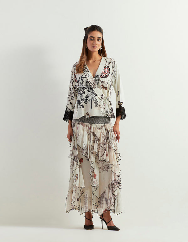 Saaya Wrap Top With Lace Detail And Ruffle Printed Skirt With Stretch Waist Band