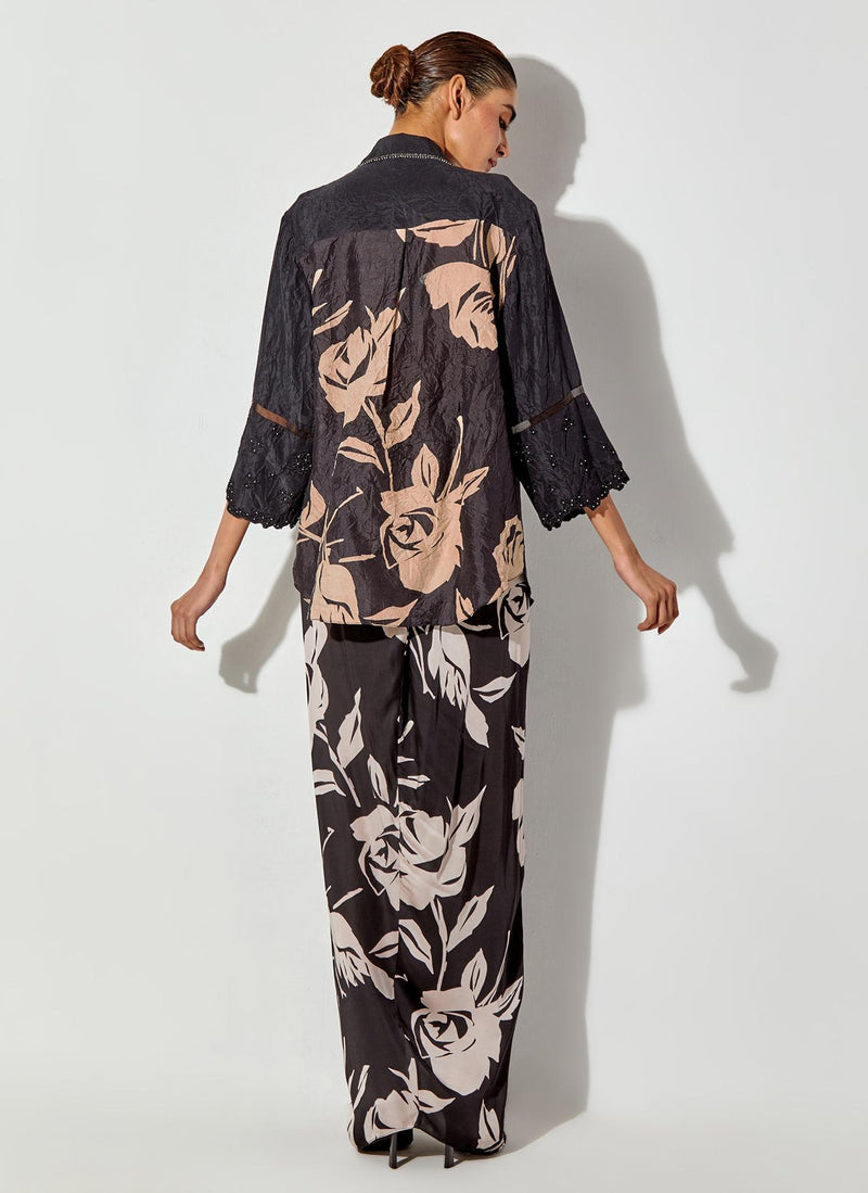 Black Silk Shirt With Embroidered Cuff Details Paired With Draped Maxi Skirt With Embroidered Detailing On Waist.