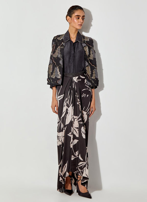 Black Silk Shirt And Fully Embroiderd Organza Gilet Paired With Draped Maxi Skirt With Embroidered Detailing On Waist
