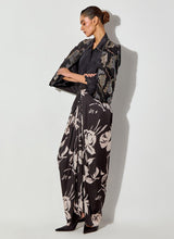 Black Silk Shirt And Fully Embroiderd Organza Gilet Paired With Draped Maxi Skirt With Embroidered Detailing On Waist