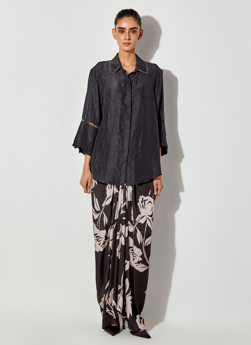Black Silk Shirt And Fully Embroiderd Organza Gilet Paired With Draped Maxi Skirt With Embroidered Detailing On Waist