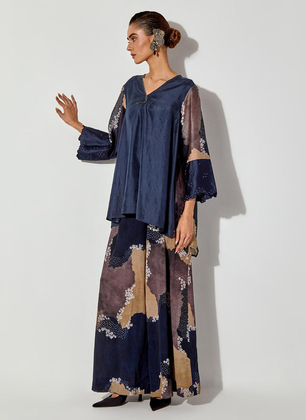 Multicolor Flared Top With Printed Back And Sleeve And Embroidered Cuff Paired With Panelled Printed Pants