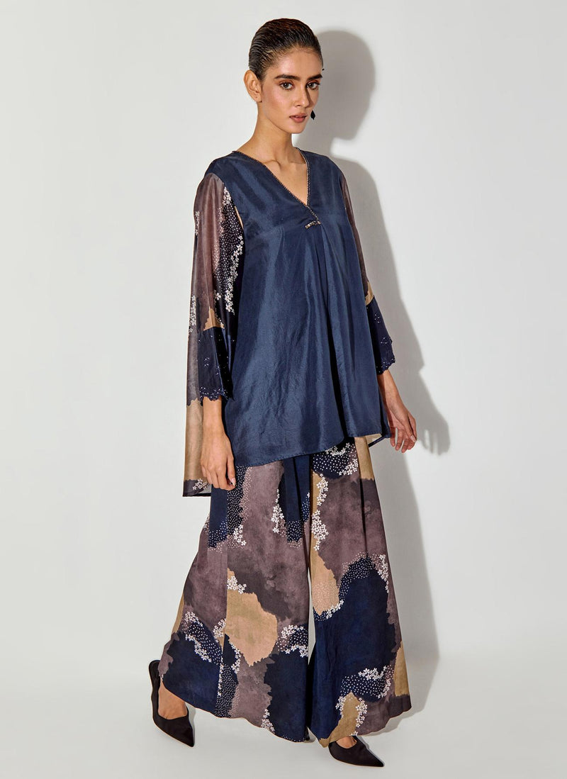 Multicolor Flared Top With Printed Back And Sleeve And Embroidered Cuff Paired With Panelled Printed Pants