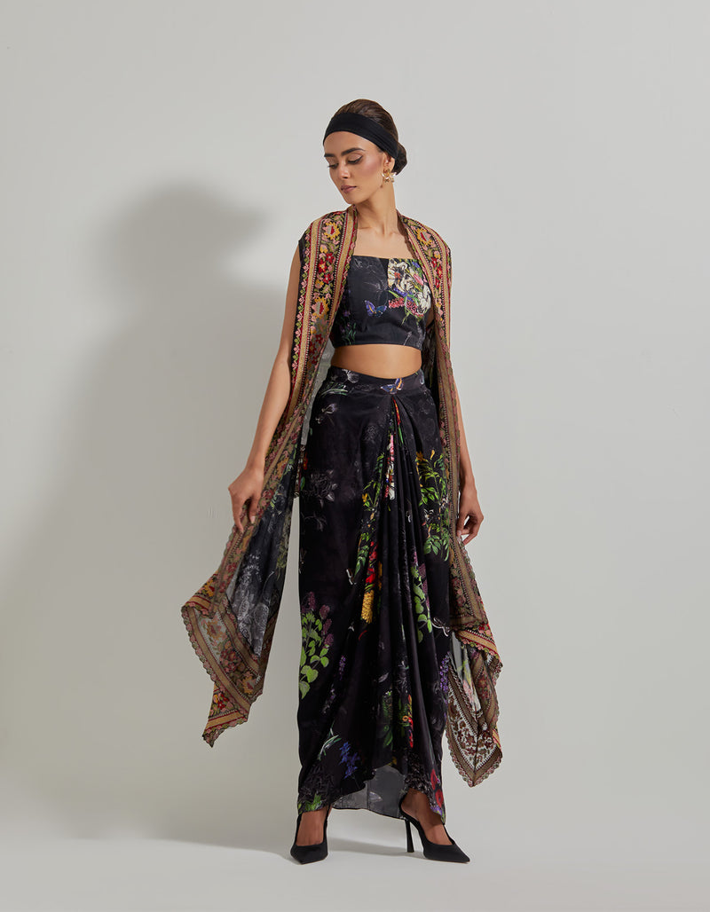 Black Botanical Drape Skirt with Printed Lycra Bustier and Cape with Cross stitch Embroidered Borders