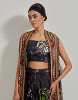 Black Botanical Drape Skirt with Printed Lycra Bustier and Cape with Cross stitch Embroidered Borders