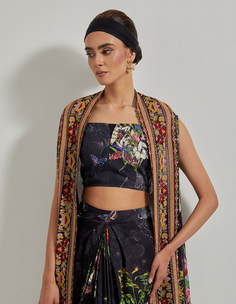 Black Botanical Drape Skirt with Printed Lycra Bustier and Cape with Cross stitch Embroidered Borders