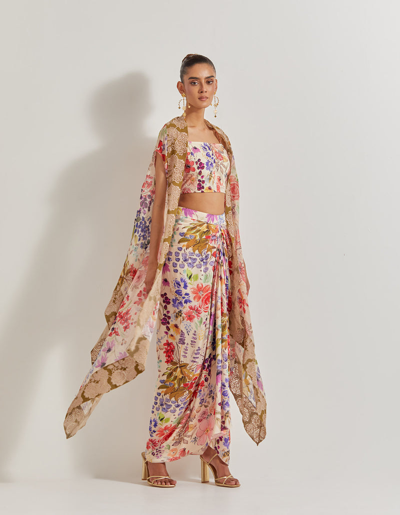 Blooming Burst Satin Cowl Skirt Paired With Stretch Bustier And Georgette Cape With Lace Border