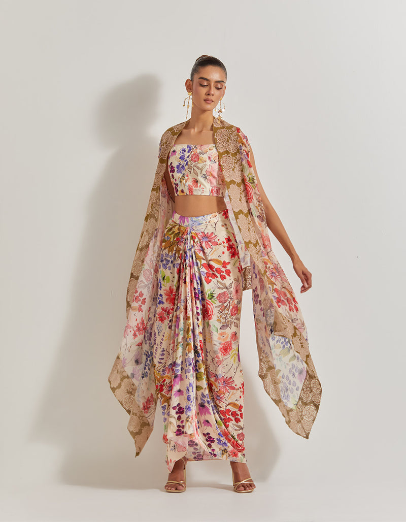 Blooming Burst Satin Cowl Skirt Paired With Stretch Bustier And Georgette Cape With Lace Border