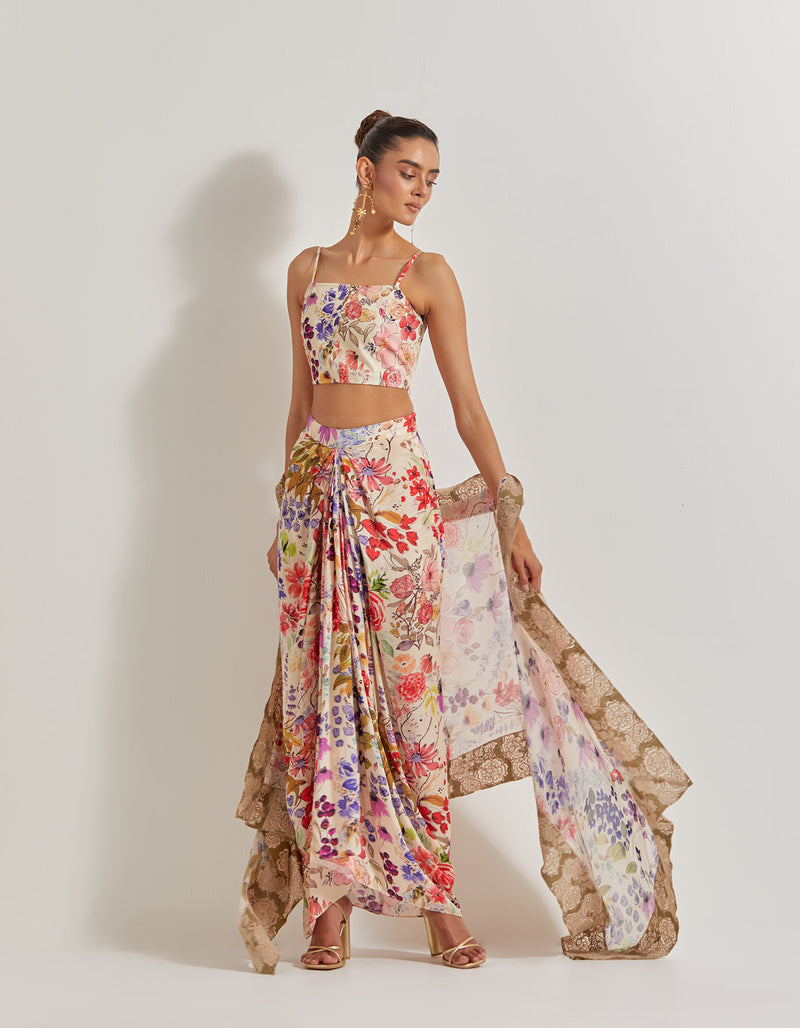 Blooming Burst Satin Cowl Skirt Paired With Stretch Bustier And Georgette Cape With Lace Border