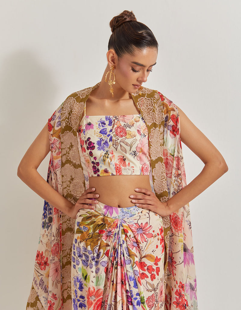 Blooming Burst Satin Cowl Skirt Paired With Stretch Bustier And Georgette Cape With Lace Border