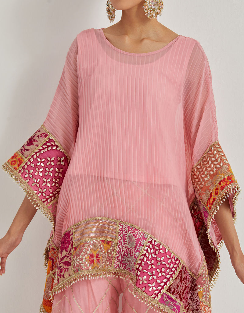 Salmon Pink Crinkle Georgette Poncho Top Paired With Organza Patch Work Sharara Pants