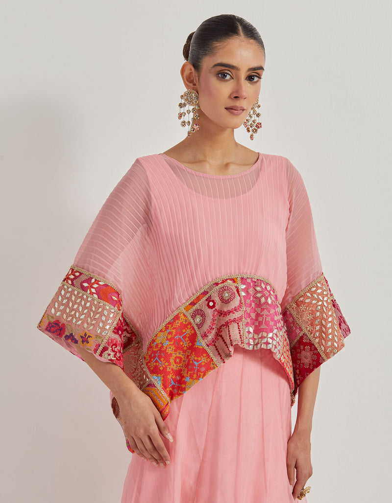 Salmon Pink Crinkle Georgette Kaftan Top With Patch Work Borders Paired With Organza Silk Patch Work Skirt