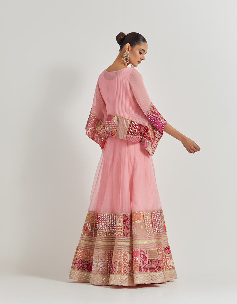 Salmon Pink Crinkle Georgette Kaftan Top With Patch Work Borders Paired With Organza Silk Patch Work Skirt