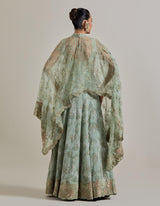 Sage Green Organza Water Glimmer Asymetric Cape Paired With Chanderi Silk Embelellished Skirt And Textured Inner