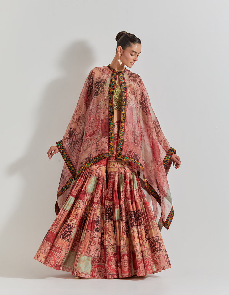 Spicy Glam Sharara Paired With Hand Embellished Bustier And Organza Cape