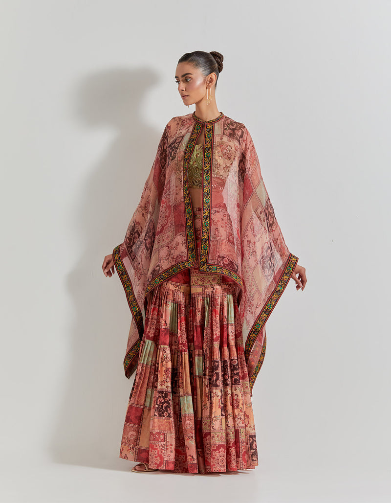 Spicy Glam Sharara Paired With Hand Embellished Bustier And Organza Cape