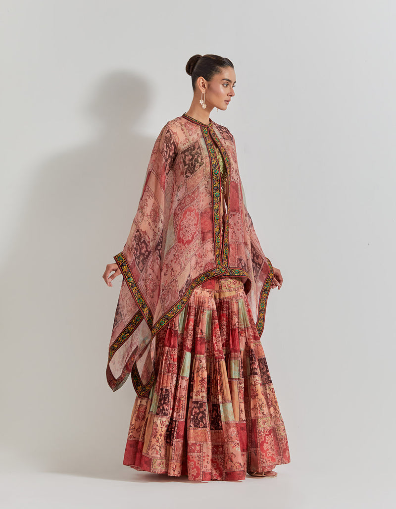 Spicy Glam Sharara Paired With Hand Embellished Bustier And Organza Cape