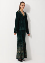 Bottle Green Peplum Velvet Jacket Paired With Flared Embroidery Trouser
