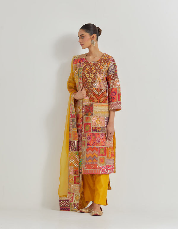 Cross Stitch Patch Work Embroidered Aline Kurta With Hand Embellished Neckline Paired With Chanderi Pants And Organza Dupatta