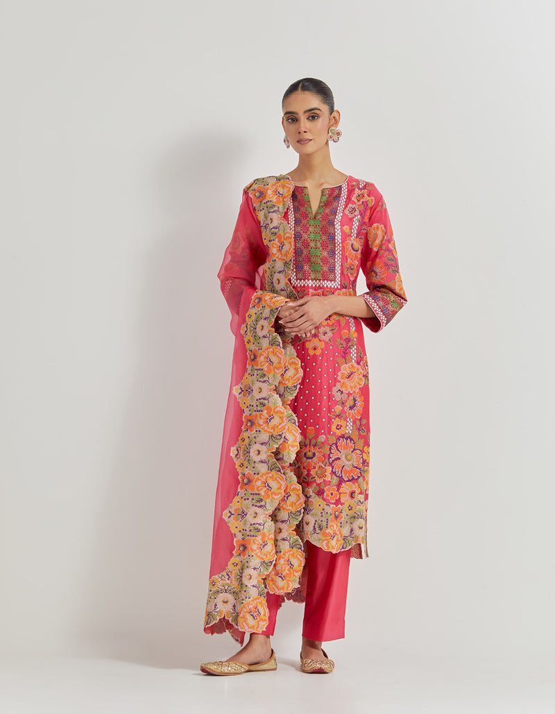 Fuchsia Cross Stitch Embroidered Kurta In Peony Motifs With Silk Brocade Borders Around And Neck And Sleeve Ends Paired With Organza Silk Dupatta