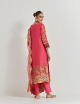 Fuchsia Cross Stitch Embroidered Kurta In Peony Motifs With Silk Brocade Borders Around And Neck And Sleeve Ends Paired With Organza Silk Dupatta