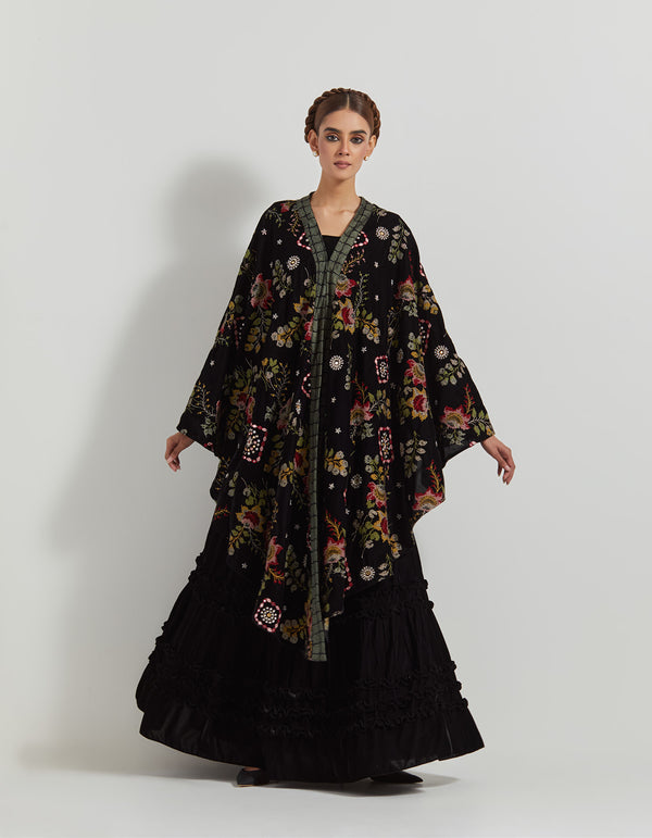 Black Velveteen Cross Stitch And Hand Embroidred Cape Paired With Pleated Emrboidered Sharara Pants And Bustier