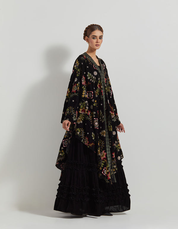 Black Velveteen Cross Stitch And Hand Embroidred Cape Paired With Pleated Emrboidered Sharara Pants And Bustier