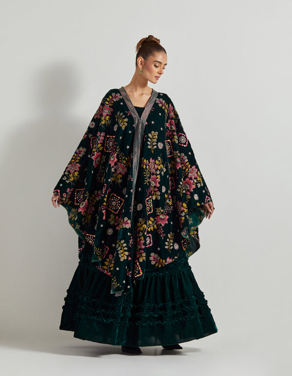 Bottle Green Velveteen Cross Stitch And Hand Embroidred Cape Paired With Pleated Emrboidered Sharara Pants And Bustier