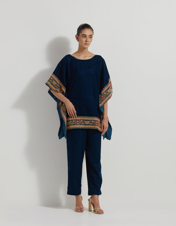 Velveteen Poncho Top With Floral Cross Stitch Borders Paired With Velveteen Straight Pants