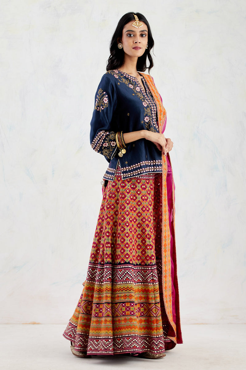 Dark Blue Kurti Top In Intricate Hand Work Paired With Paired With Gota Patti And Cross Stitch Lehnga And Fuchsia Organza Dupatta
