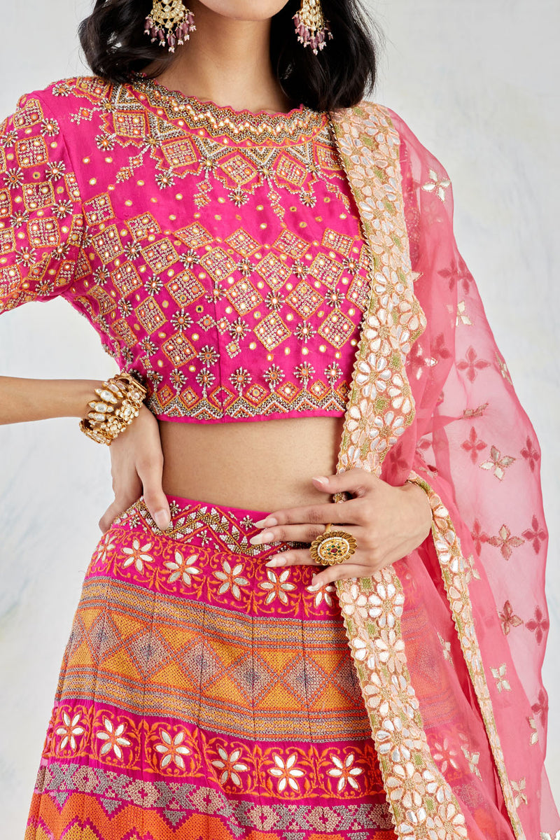 Intricately Embroidered Blouse Teamed With Gota Patti And Cross Stitch Lehnga And Organza Dupatta