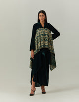 Velvet Asymetric Top Paired With a Skirt