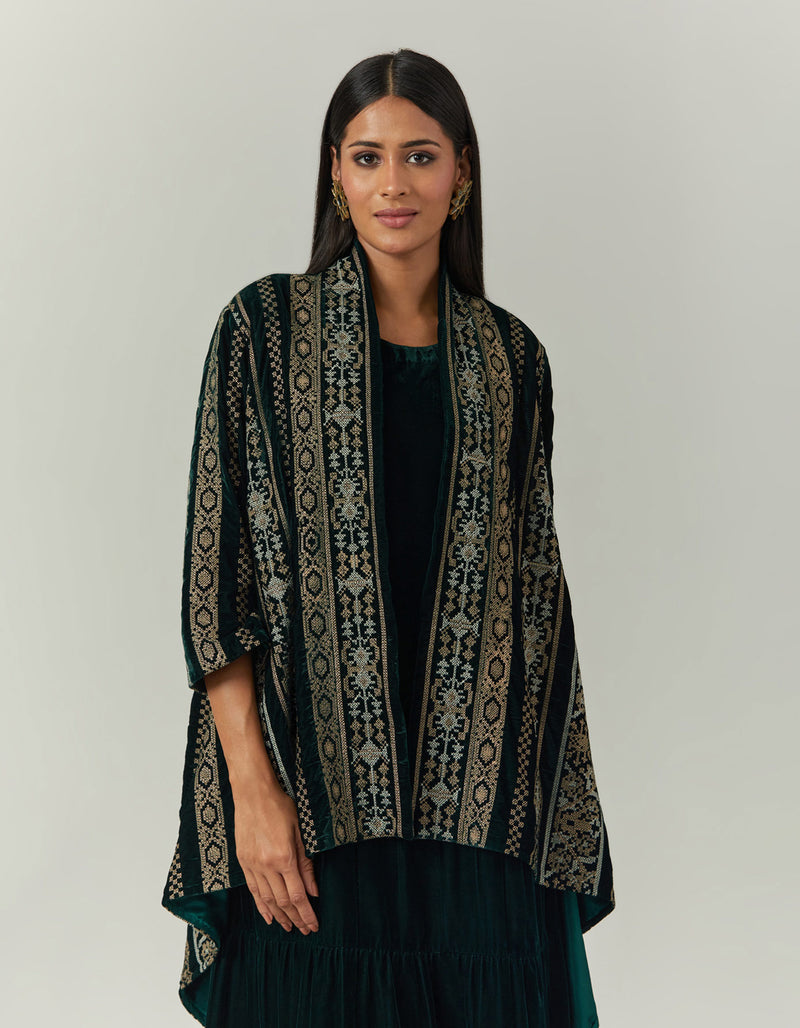 Bottle Green Dress Paired With a Jacket Cape